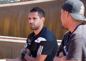 lewis jetta of the west coast eagles talking to program participant at wirrpanda employment program