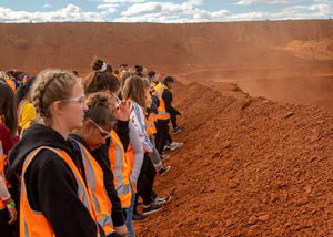 group of deadly sista girlz in high vis at red dirt mine site